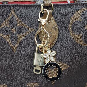 Authentic Louis Vuitton Lock & Key with Unbranded Flower Charm, Keychain